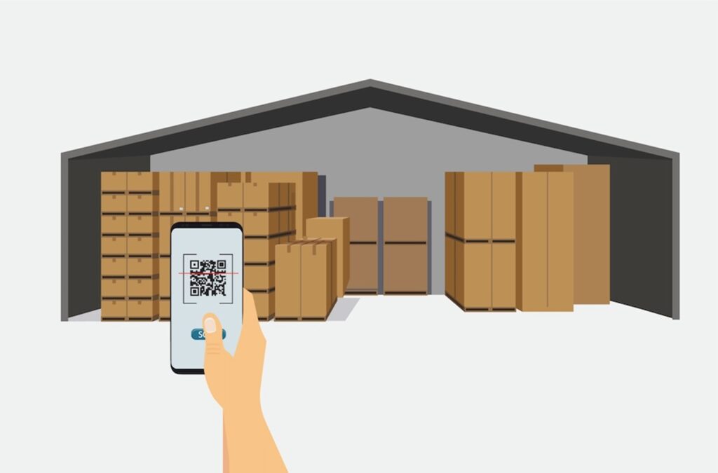 scanning a QR Code with a phone in a warehouse